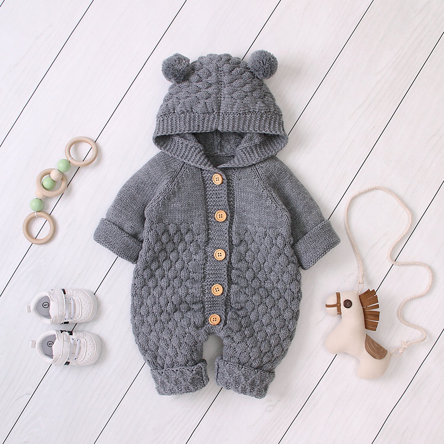 Gestrickter Baby Strampler
